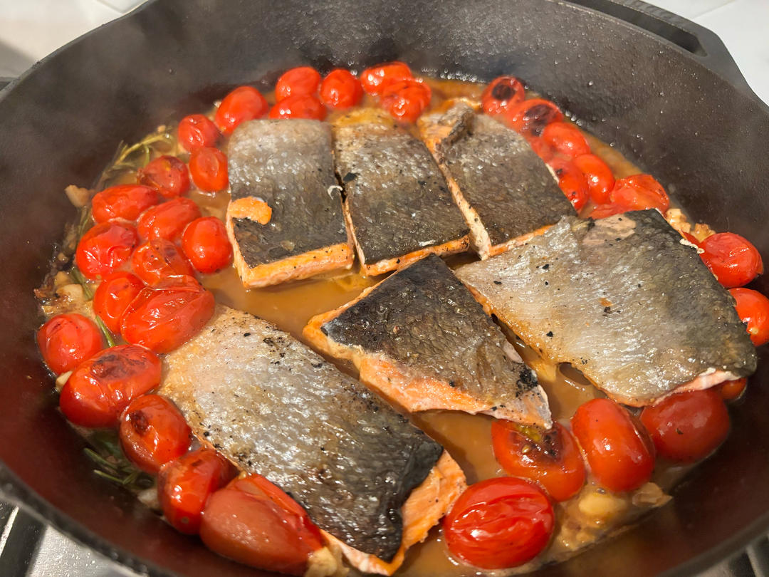Simmer salmon together
