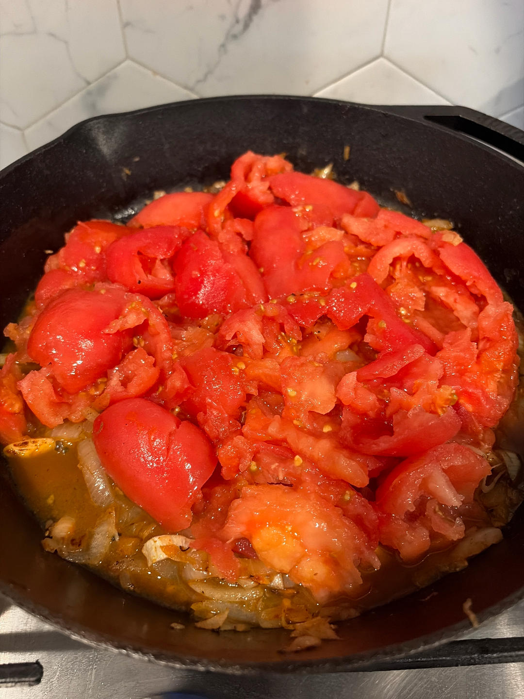 Add and crush the tomatoes