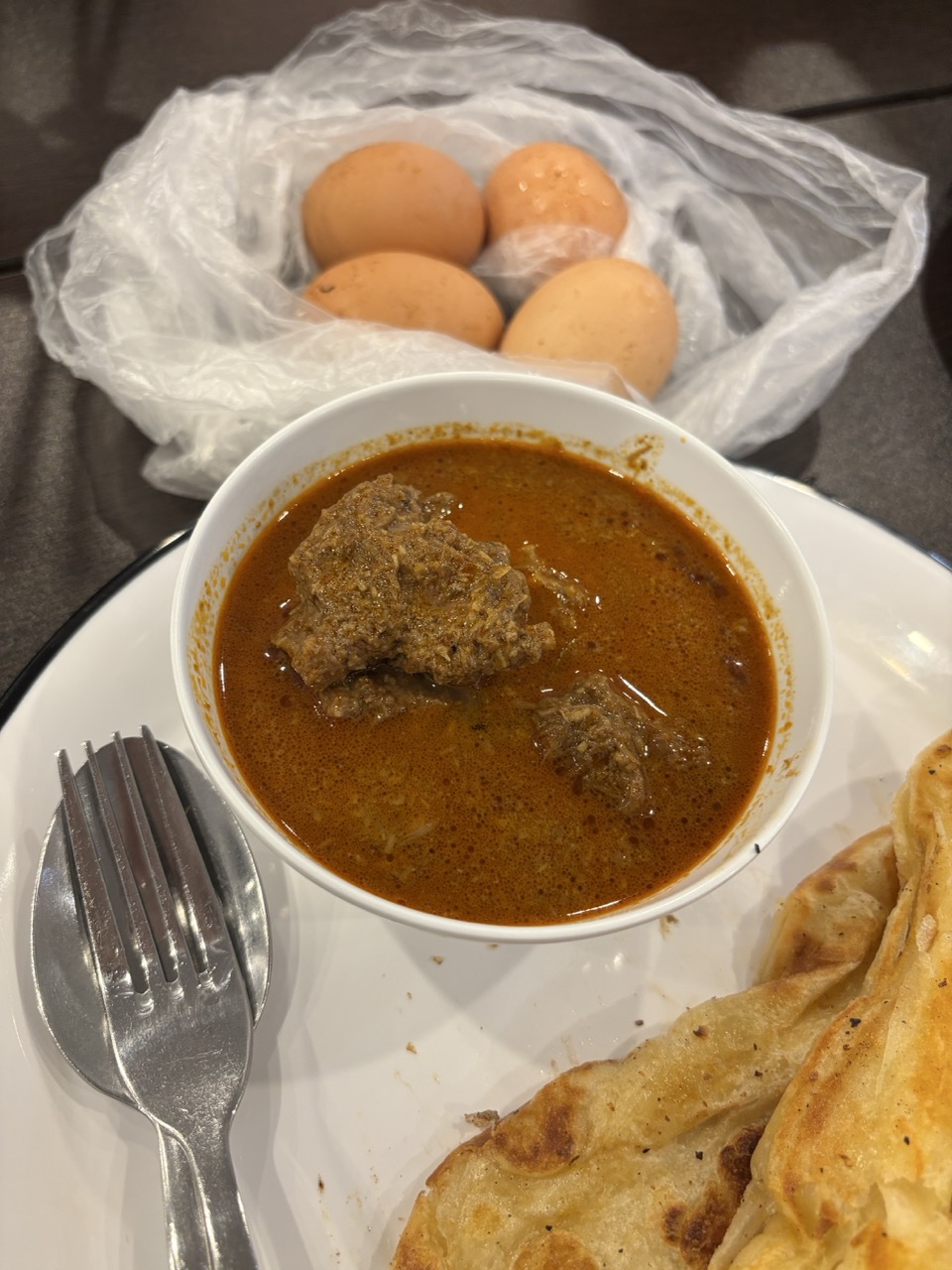 Rendang beef with boiled eggs